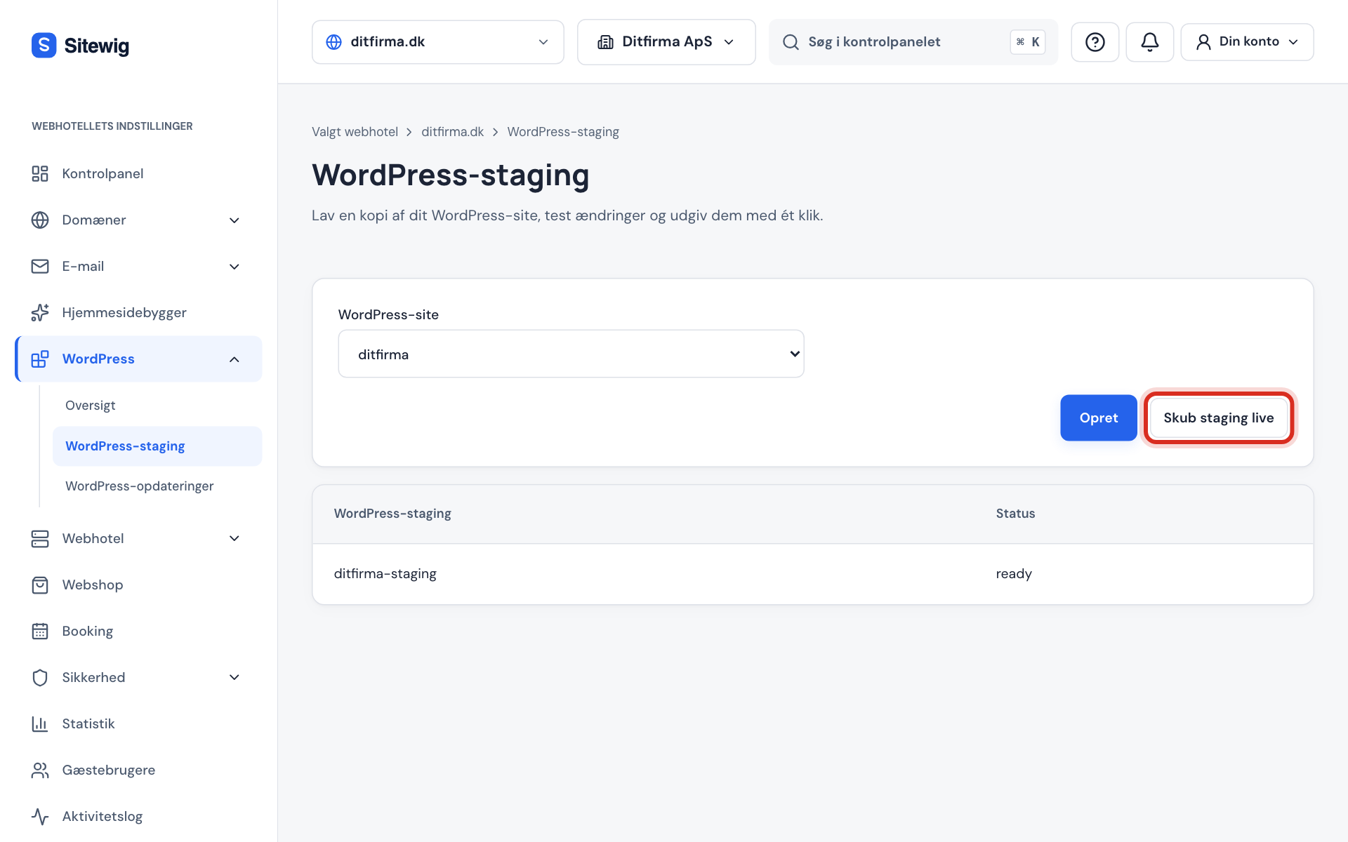 Siden WordPress-staging med valg af WordPress-site, staging-kopien ditfirma-staging og knappen Skub staging live markeret